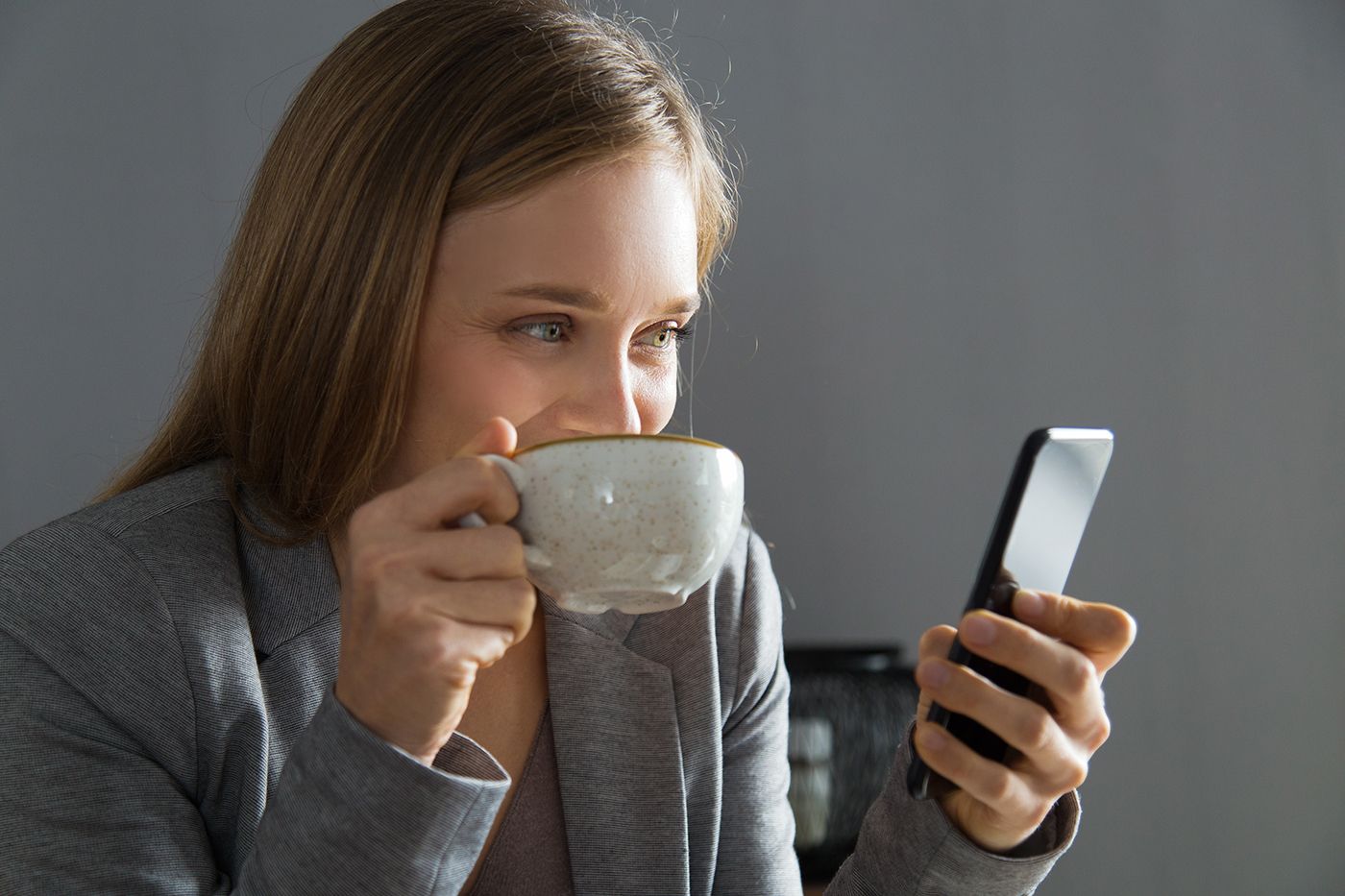 This woman is not following proper video conferencing etiquette. We can hear you slurp your coffee.